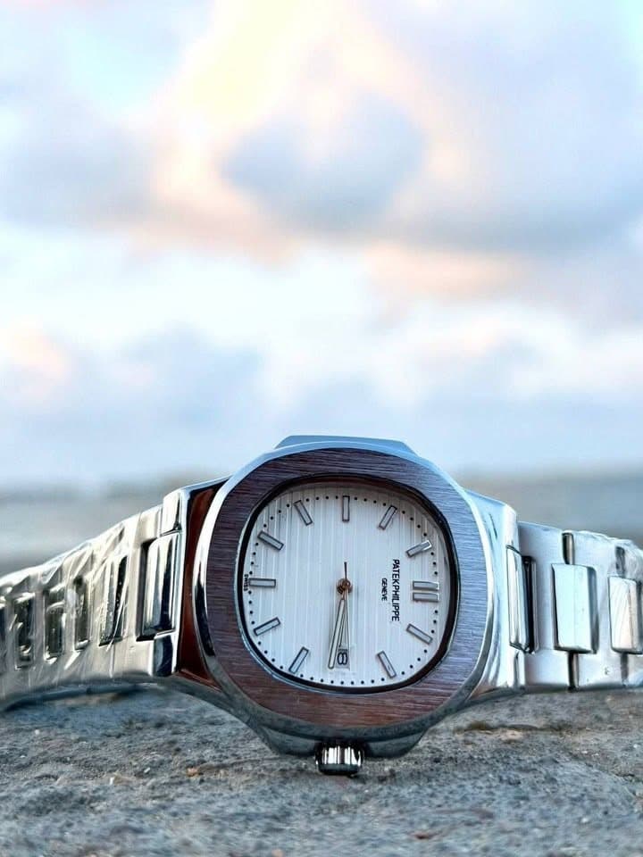 White dial Nautilus-style metal watch front view