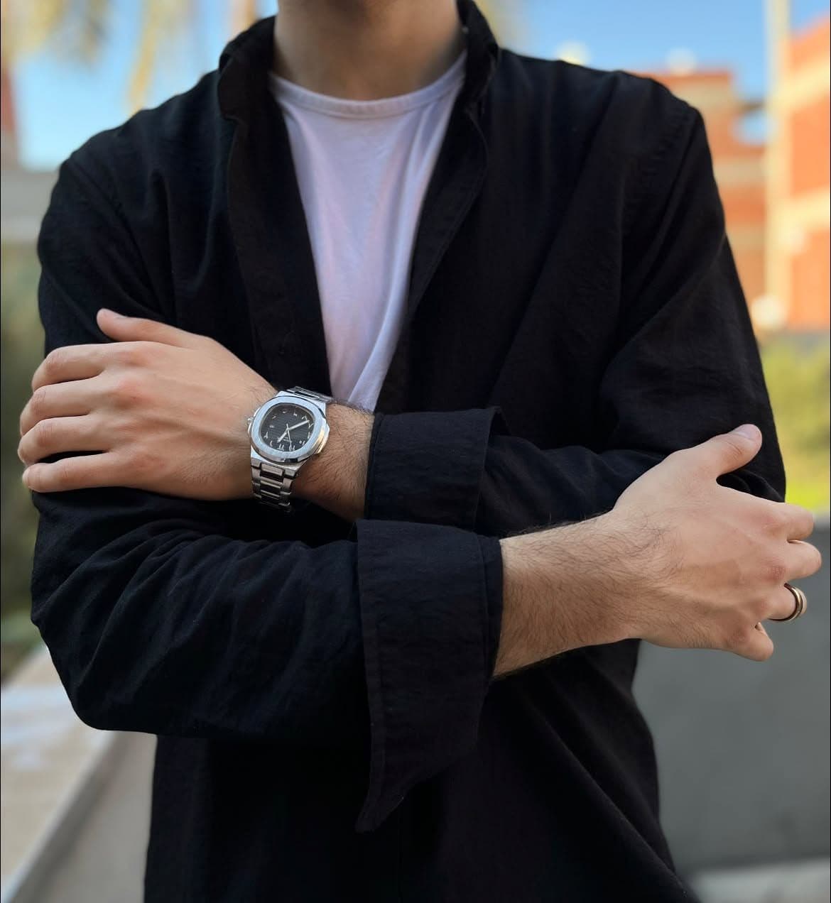 White dial metal watch lifestyle wrist view