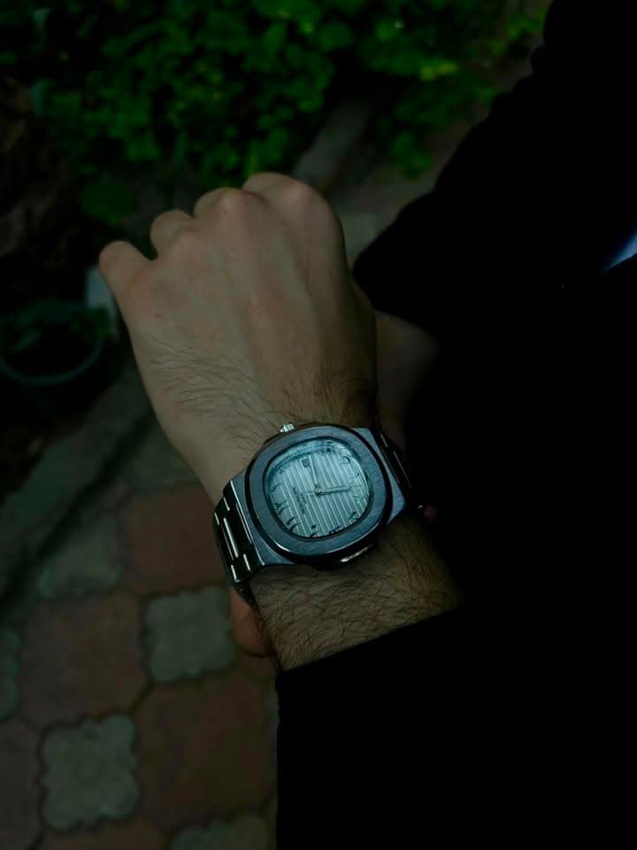 White dial metal watch evening wrist view
